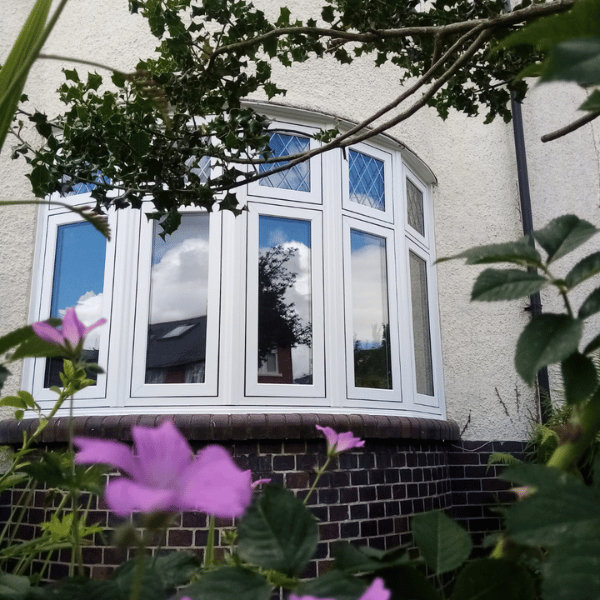 White uPVC French doors and side wi