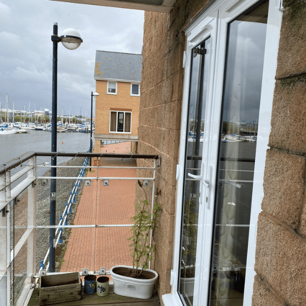 French-doors-on-a-balcony-overlook-Cardiff-bay