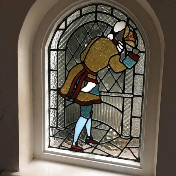 Stained glass arch window