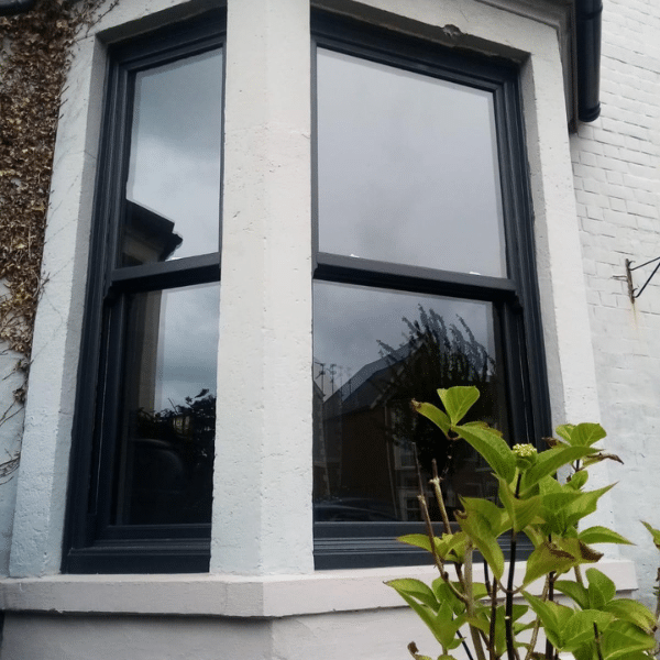 grey sash windows in bay