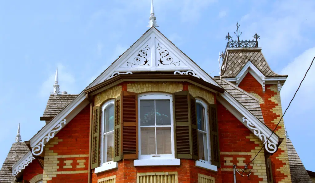 fragment of red brick victorian house