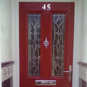 red front door with silver letter box